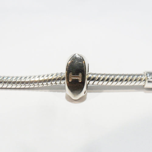 TT336G Engraved Triangle Spacer Charm