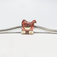 TE045PK Peach Coloured Pram Charm