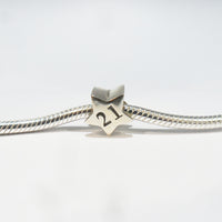 TT237_21 Silver Star 21 Charm